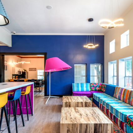 Clubhouse lounge with eclectic colorful seating and decor